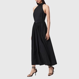 Model wearing All Saints black halterneck midi dress with gathered skirt, styled with black strappy heeled sandals