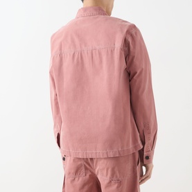 Model wearing Farah Vintage Mattison Denim Jacket in Dusty Red, rear view, paired with matching trousers, long sleeves, button fastenings visible