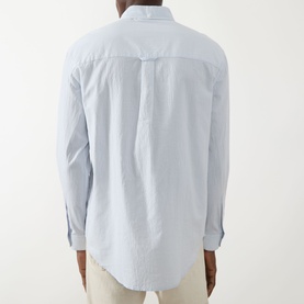 Model wearing Farah Vintage Casual Shirt in Blue Nickle, back view, fine stripe cotton with button-down collar and curved hem