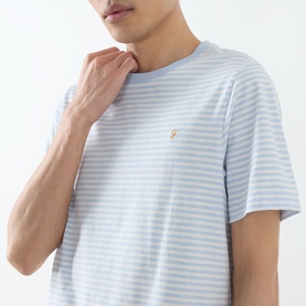 Model wearing Farah Vintage Castle Logo Striped T-Shirt in Blue Nickle, short sleeves, crew neck, small logo detail visible on chest.