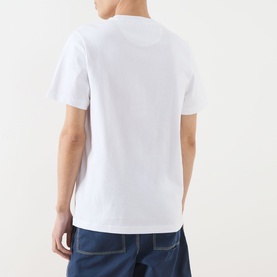 Model wearing Farah Vintage Clissold Logo T-Shirt in white, rear view, crew neck, short sleeves, styled with blue denim jeans.