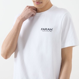 Model wearing Farah Vintage Clissold Logo T-Shirt in white, featuring small chest logo print, crew neck, and short sleeves.