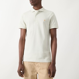 Model wearing Farah Vintage Blanes Logo Polo Shirt in Soft Green, short sleeves, polo collar with button fastenings, small logo detail