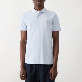 Model wearing Farah Vintage Blanes Logo Polo Shirt in Blue Nickle, short sleeves, polo collar with button fastenings, small logo detail on chest