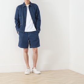 Model wearing Farah Vintage Swinton Logo Drawstring Shorts in Aegean Blue with matching jacket, white tee and white trainers.