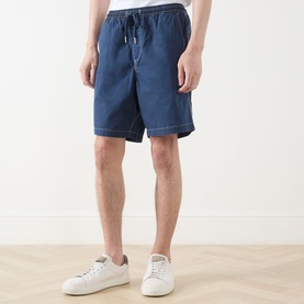 Model wearing Farah Vintage Swinton Logo Drawstring Shorts in Aegean Blue with white trainers. Elasticated drawstring waist, relaxed fit.