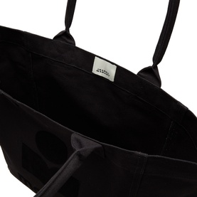 Isabel Marant black cotton tote bag interior view, showing open top, internal pockets, and branded label, with twin handles