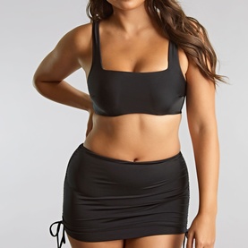 Model wearing Panache Gina Square Bikini Top in black, wired, seamless cut. Styled with matching black ruched mini skirt
