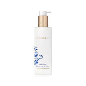 Rituals Hand Balm in white pump bottle with gold cap, featuring blue floral botanical illustration and blue brand text.