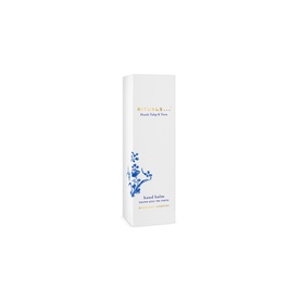 Rituals Hand Balm in tall white box packaging with blue floral detailing and brand typography on front.