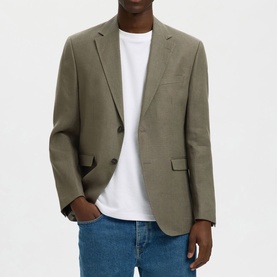 Model wearing Selected olive green suit jacket, styled with white crew-neck tee and blue jeans. Single-breasted, notch lapel.
