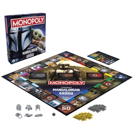 Star Wars: The Mandalorian and Grogu Monopoly board game, shown open with game board, tokens, cards and components displayed