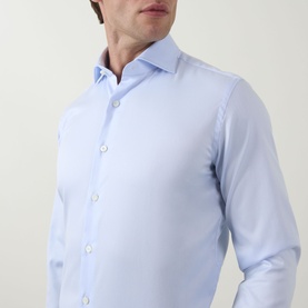Model wearing Gherardi Light Blue Double Cuff Regular formal shirt in 100% cotton, featuring a spread collar and button placket.