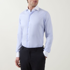 Model wearing Gherardi Twill Striped Single-Cuff Shirt in light blue with white contrast collar and cuffs, styled with black trousers.