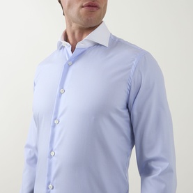 Model wearing Gherardi Twill Striped Single-Cuff Shirt in light blue with contrasting white collar and front button fastening.