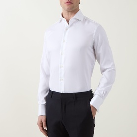 Model wearing Gherardi white double cuff regular formal shirt in 100% cotton, styled with black trousers