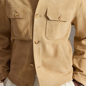 Model wearing Ralph Lauren Cafe Tan casual jacket, close-up of double chest pockets with button fastening detail