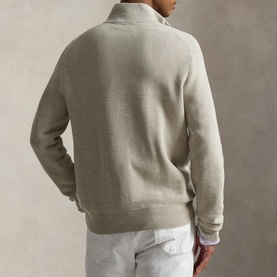 Model wearing Ralph Lauren light walnut brown heather knit half-zip jumper, styled with light grey joggers, rear view.