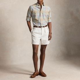 Model wearing Ralph Lauren Khaki Fadedmint plaid regular shirt, styled with white chino shorts, brown belt and loafers.