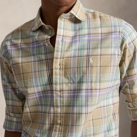 Model wearing Ralph Lauren Reg Shirt in khaki and faded mint plaid check, long sleeves rolled, small pony logo on chest