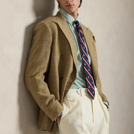 Model wearing Ralph Lauren Faded Mint/White striped reg shirt, styled with a houndstooth blazer, navy stripe tie, and cream trousers.
