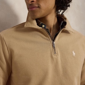 Model wearing Ralph Lauren vintage khaki quarter-zip sweatshirt with embroidered pony logo and checked collar lining detail