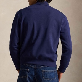 Model wearing Ralph Lauren Newport Navy sweatshirt, back view, styled with blue jeans