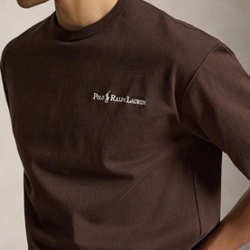Model wearing Ralph Lauren nutmeg brown crew neck T-shirt with embroidered Polo Ralph Lauren chest logo.