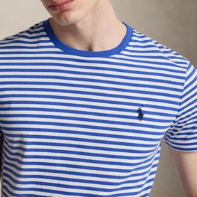 Model wearing Ralph Lauren T-Shirt in New Iris Blue and White horizontal stripes with embroidered Polo Pony logo at chest
