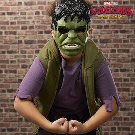 Child wearing Superheroes Hulk mask and costume, green face mask with open mouth expression, olive vest, posed with fists clenched