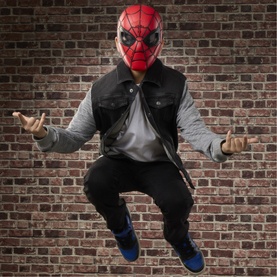 Model with Superheroes Spider-Man Wisecrackin' Glow Mask in red and black, styled with grey hoodie, black vest and blue trainers