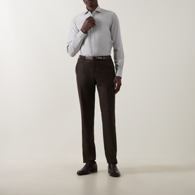 Model wearing Gherardi grey cotton-cashmere casual shirt, styled with dark brown tailored trousers and brown leather dress shoes.