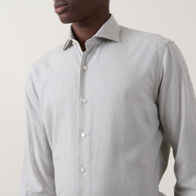 Model wearing Gherardi grey cotton cashmere casual shirt, close-up of spread collar and button placket detail.
