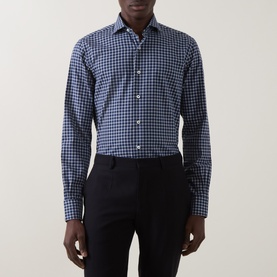 Model wearing Gherardi navy cotton casual shirt in gingham check, styled with black trousers