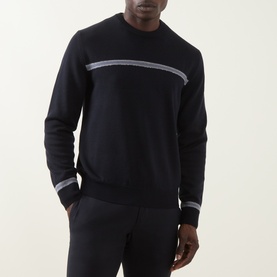 Model wearing Herno Contrast Stripe Sweater in dark blue with crew neck, grey stripe across chest, and ribbed trims, styled with navy trousers.