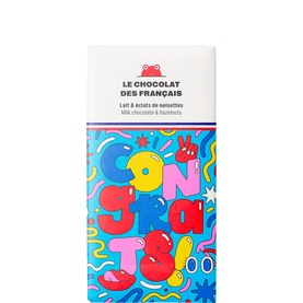 Le Chocolat Des Francais 41% Milk Chocolate Bar With Hazelnuts in bold multicoloured Congrats graphic packaging