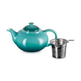 Le Creuset Stoneware Classic Teapot With Infuser 1.3L in teal, shown with stainless steel mesh infuser basket alongside
