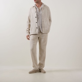 Model wearing Profuomo Beige Notched Collar Overshirt in linen-cotton, styled with matching beige trousers and desert boots