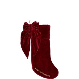 Vondels red velvet Christmas stocking with oversized bow detail and Santa's Favorite embroidered text, gold hanging loop