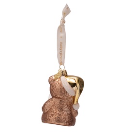 Rose gold glass bear Christmas tree ornament with gold Santa hat, hanging from a cream branded ribbon, rear view