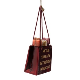 Red miniature shopping bag Christmas ornament with gold "Retail Therapy Is The Best Medicine" text and small gift box details