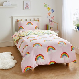Catherine Lansfield Rainbow Hearts Duvet Set Pink on a single bed, featuring colourful rainbow print