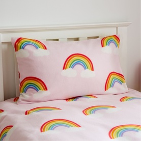 Catherine Lansfield Rainbow Hearts Duvet Set in pink, styled on a single bed with rainbow print pillowcase and duvet cover visible