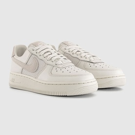 Nike Air Force 1 low-top trainers in phantom white, perforated leather upper, tonal laces and off-white cupsole