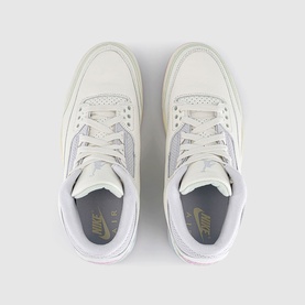 Nike Air Jordan 3 Retro trainers in off-white, overhead view showing lace detail, grey tongue lining and gold Nike Air branding