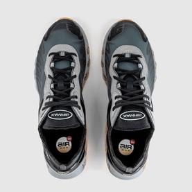 Nike Air Max trainers in cool grey, top-down view showing mesh upper, black overlays, and tan gum-style sole detailing
