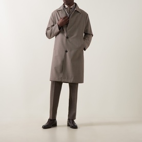 Model wearing Hugo Boss Open Brown wool coat, single-breasted with shirt collar, styled with matching trousers and dark leather shoes