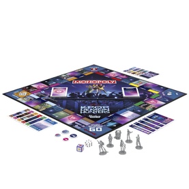 Monopoly KPop Demon Hunters board game laid out showing gameboard, 6 tokens, dice, cards and fan chips in multi-colour design