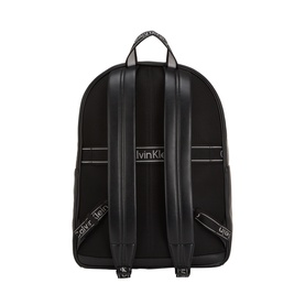 Calvin Klein black backpack, rear view, silver-tone logo strap details, top carry handle, padded back panel