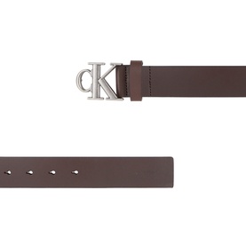 Calvin Klein dark brown leather belt with silver-tone CK monogram logo buckle, shown flat with punched holes visible.